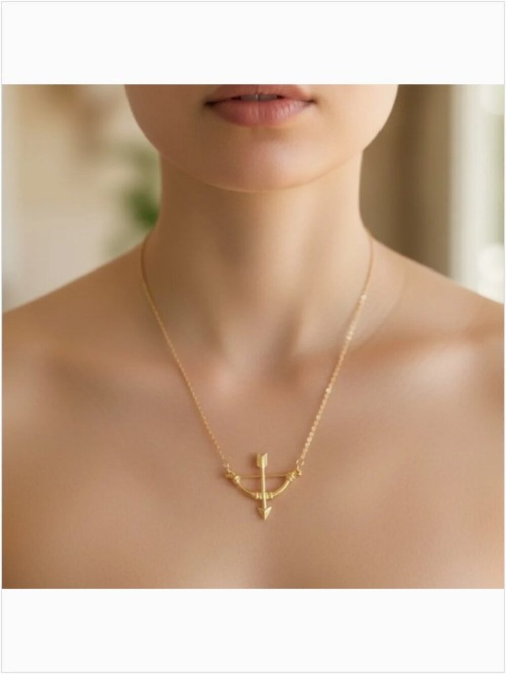 Delicate Gold Tone Bow and Arrow Necklace